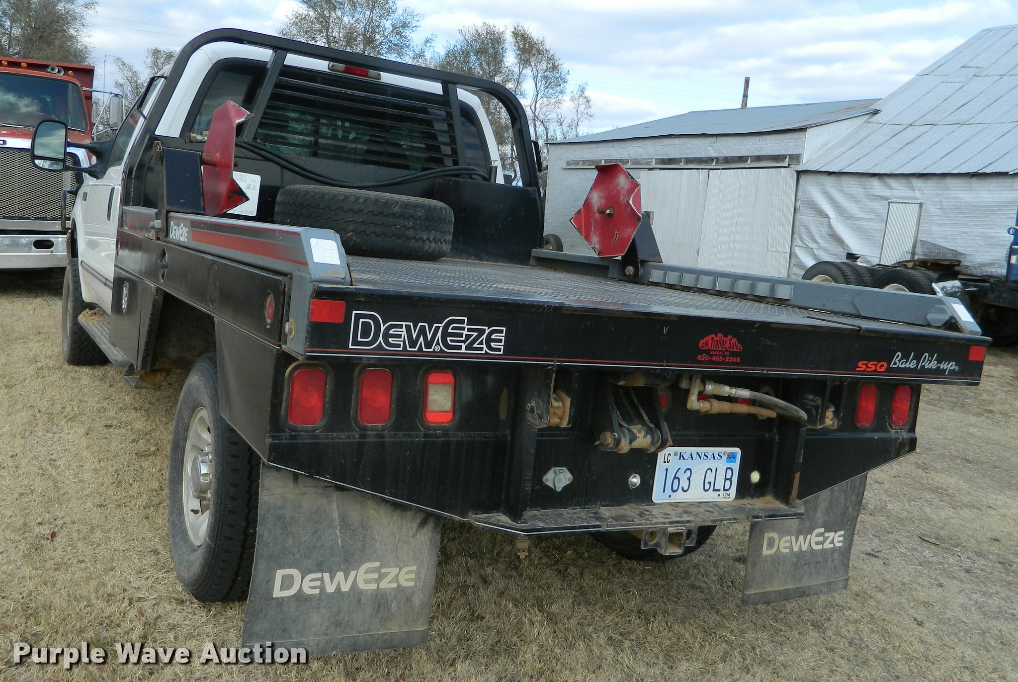 1999 Ford F350 Super Duty SuperCab bale bed pickup truck