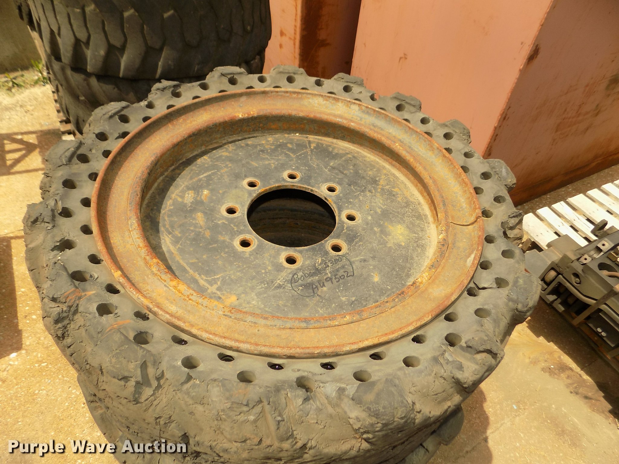 (8) solid skid steer tires in Omaha, NE Item AU9502 sold Purple Wave
