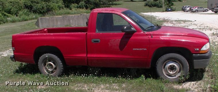 image for item DK9675 1998 Dodge Dakota flatbed pickup truck