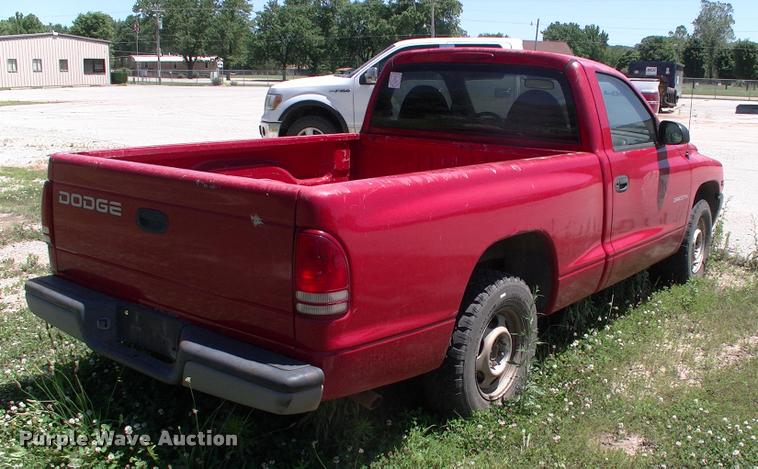 image for item DK9675 1998 Dodge Dakota flatbed pickup truck