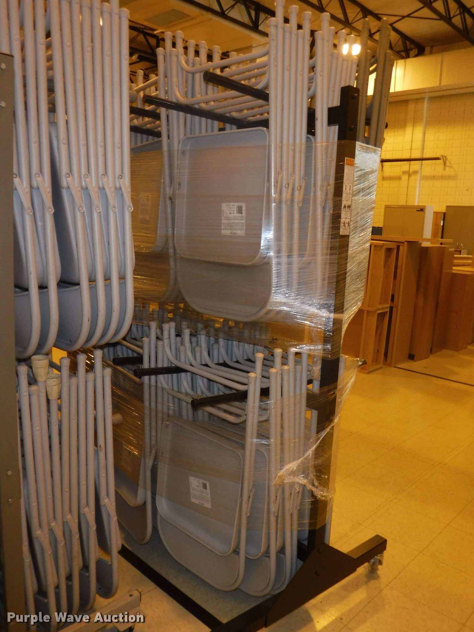 (172) folding chairs in Overland Park, KS Item DL9602 sold Purple Wave