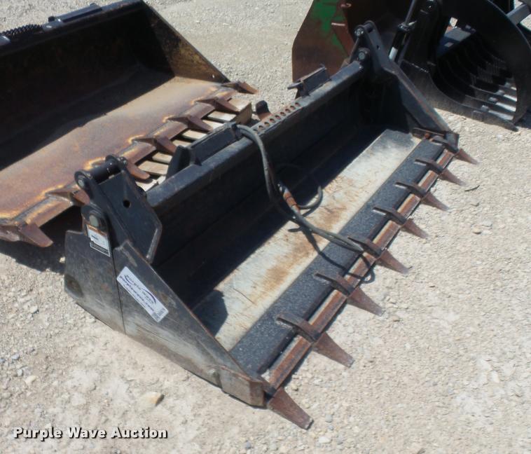 image for item DA5579 2010 John Deere four-in-one multipurpose bucket