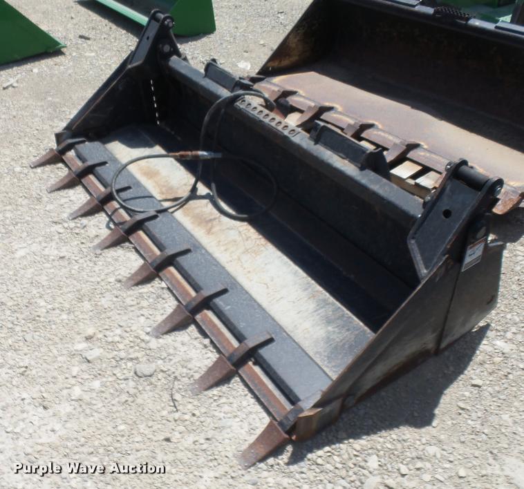 image for item DA5579 2010 John Deere four-in-one multipurpose bucket