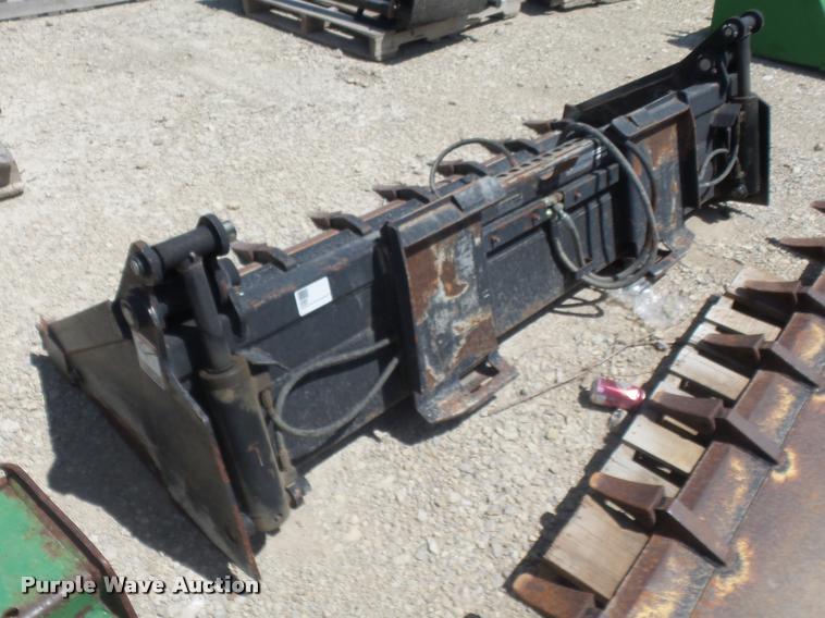 image for item DA5579 2010 John Deere four-in-one multipurpose bucket