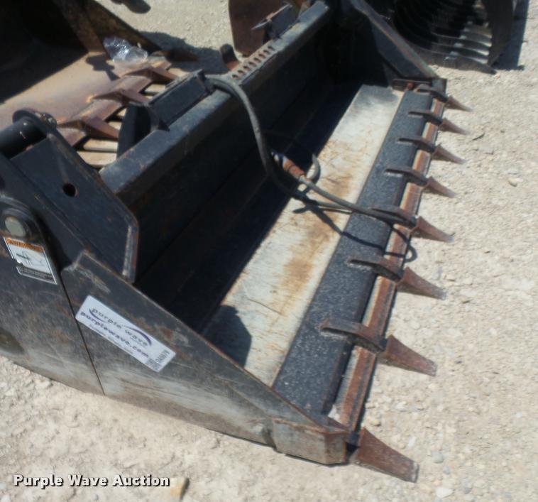 image for item DA5579 2010 John Deere four-in-one multipurpose bucket