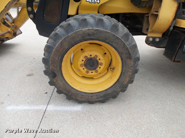 image for item DA2739 John Deere 110 backhoe