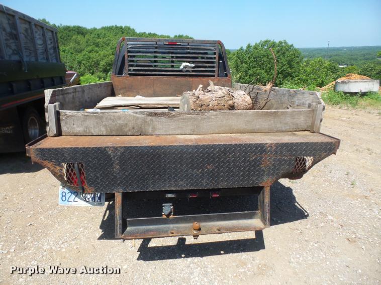 image for item DA6444 1995 Ford F350 Super Duty Crew Cab flatbed pickup truck