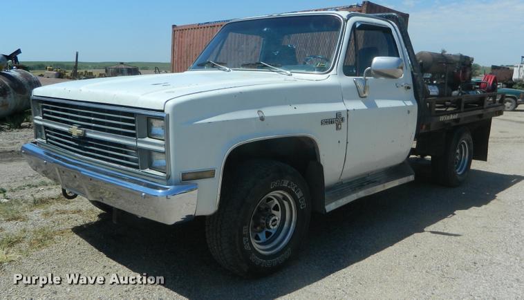 image for item DB1063 1983 Chevrolet 1500 flatbed pickup truck