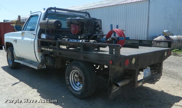 image for item DB1063 1983 Chevrolet 1500 flatbed pickup truck