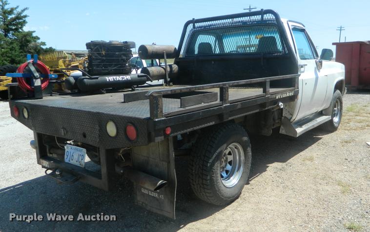 image for item DB1063 1983 Chevrolet 1500 flatbed pickup truck