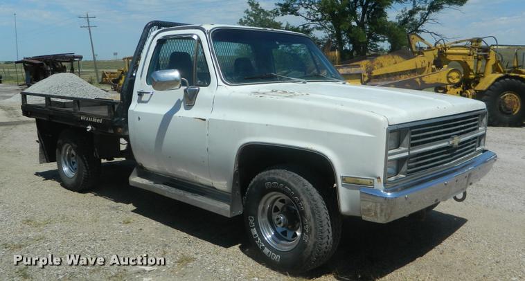 image for item DB1063 1983 Chevrolet 1500 flatbed pickup truck