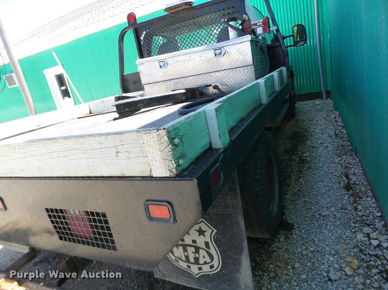image for item DB5785 2006 Ford F350 Super Duty flatbed pickup truck