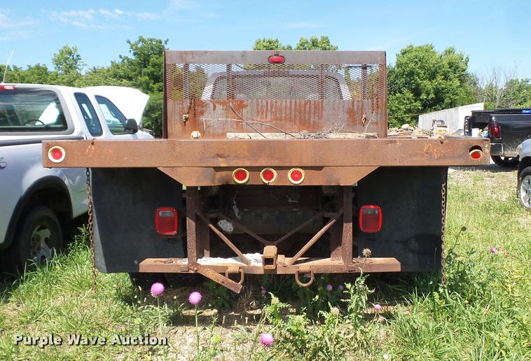 image for item DJ9555 1997 Ford F350 flatbed pickup truck