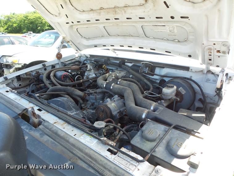 image for item DJ9555 1997 Ford F350 flatbed pickup truck