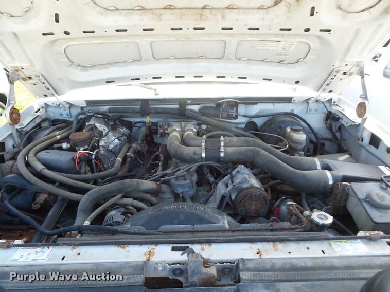 image for item DJ9555 1997 Ford F350 flatbed pickup truck