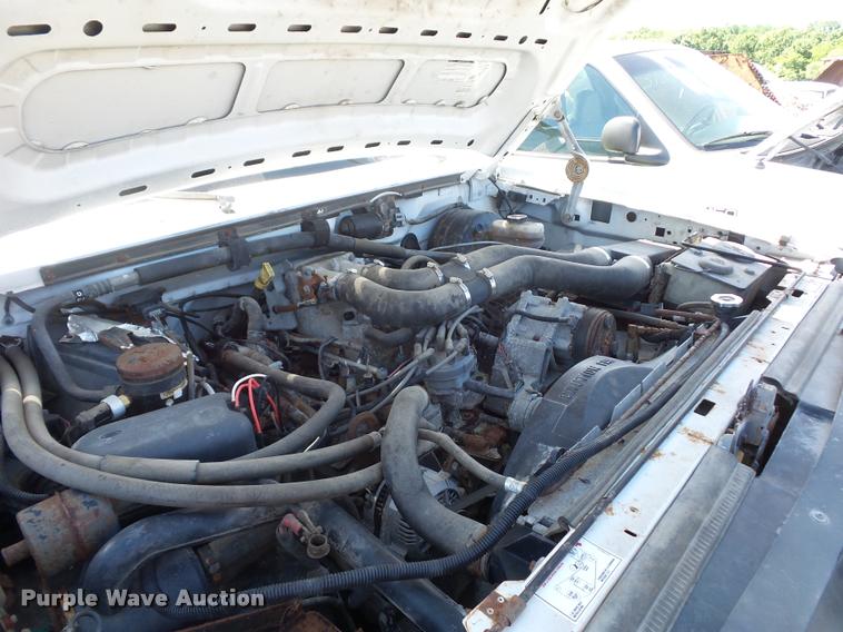 image for item DJ9555 1997 Ford F350 flatbed pickup truck