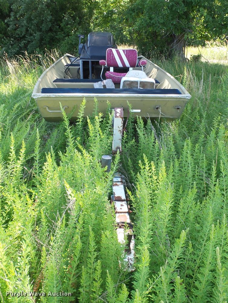 image for item DJ9556 Lowe Commander boat and trailer