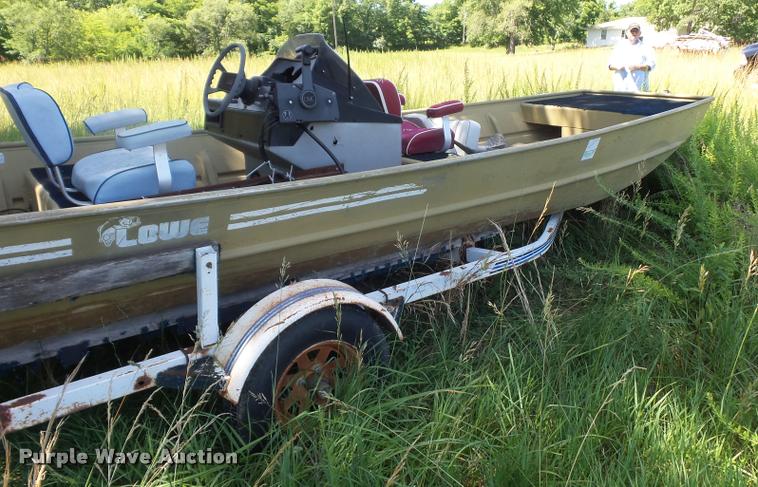 image for item DJ9556 Lowe Commander boat and trailer
