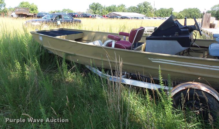 image for item DJ9556 Lowe Commander boat and trailer