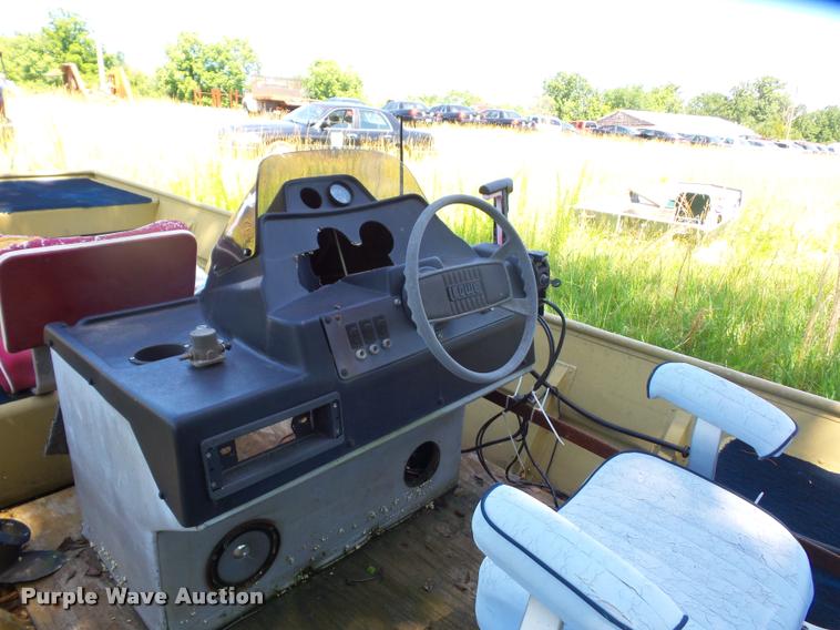 image for item DJ9556 Lowe Commander boat and trailer