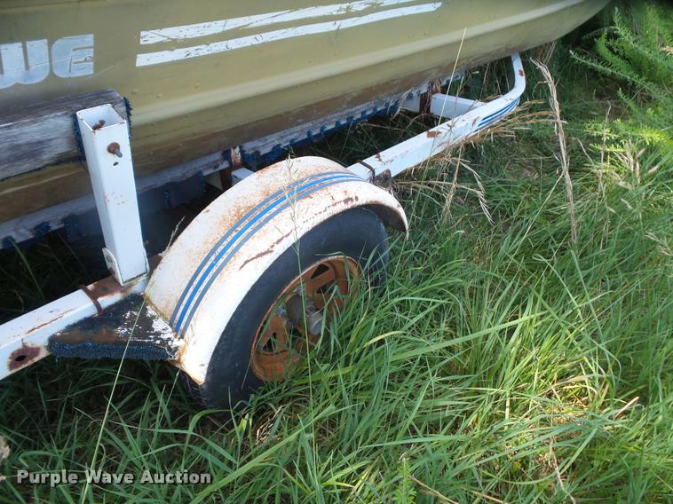 image for item DJ9556 Lowe Commander boat and trailer