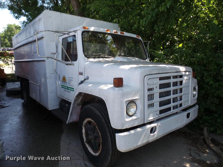 image for item DA6441 1984 International S1700 chip bed dump truck