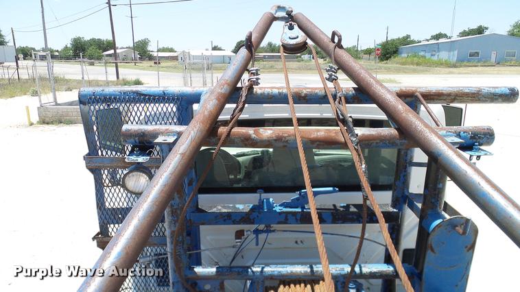 image for item DA6794 2004 International DuraStar 4300 winch truck