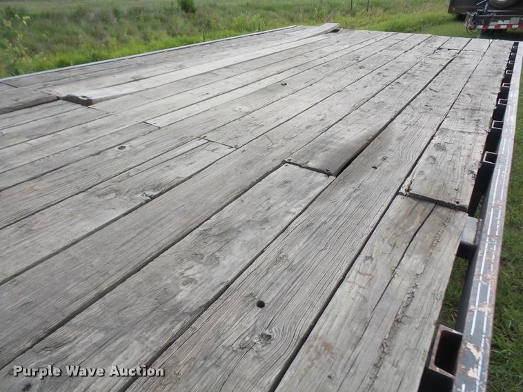 image for item DA1502 2000 Trailman Load-Eez flatbed trailer