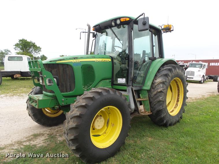 image for item DA2749 2002 John Deere 6420 MFWD tractor