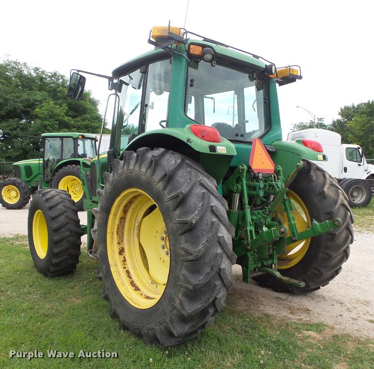image for item DA2749 2002 John Deere 6420 MFWD tractor