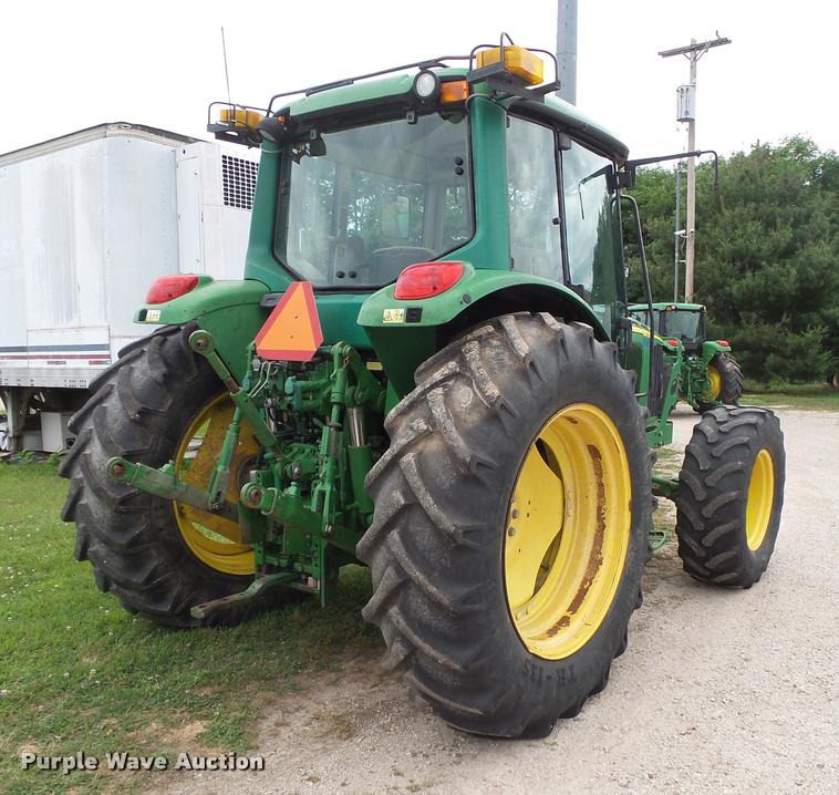 image for item DA2749 2002 John Deere 6420 MFWD tractor