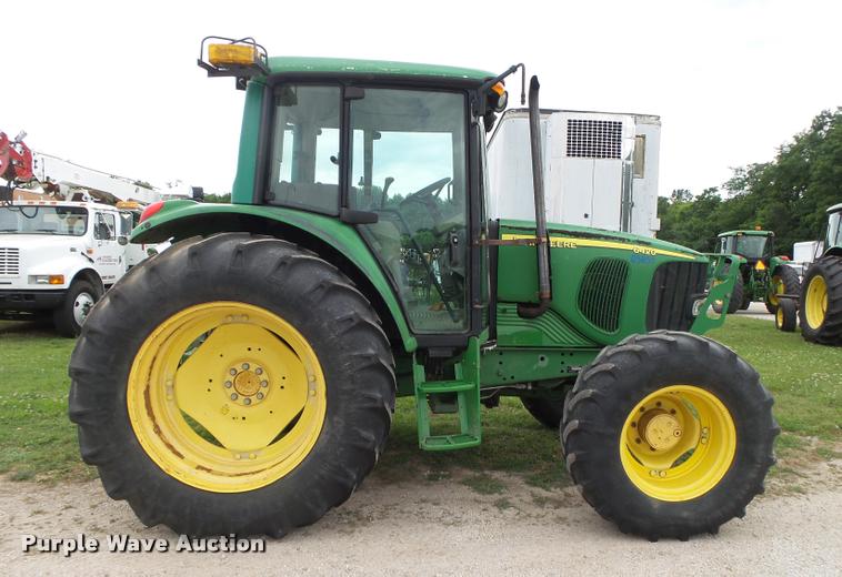 image for item DA2749 2002 John Deere 6420 MFWD tractor