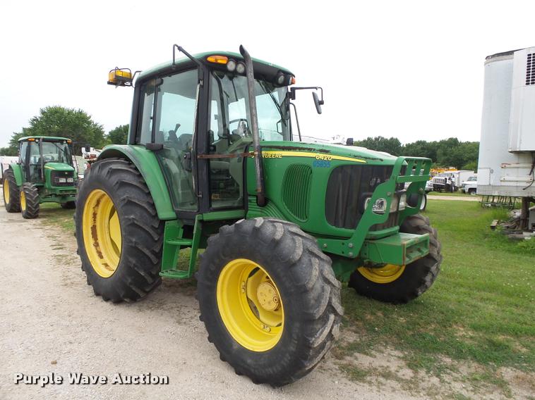 image for item DA2749 2002 John Deere 6420 MFWD tractor