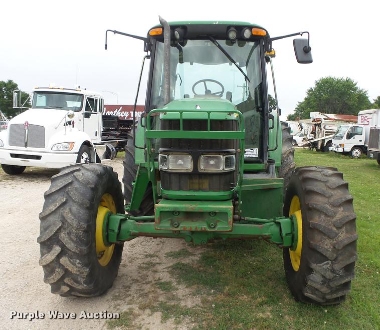 image for item DA2749 2002 John Deere 6420 MFWD tractor