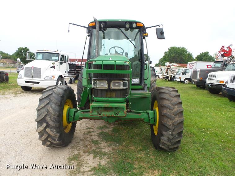 image for item DA2749 2002 John Deere 6420 MFWD tractor