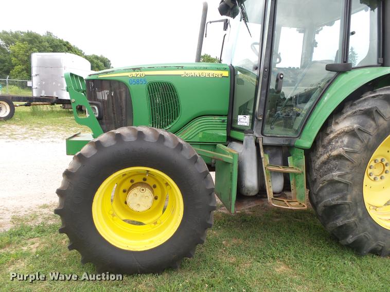image for item DA2749 2002 John Deere 6420 MFWD tractor