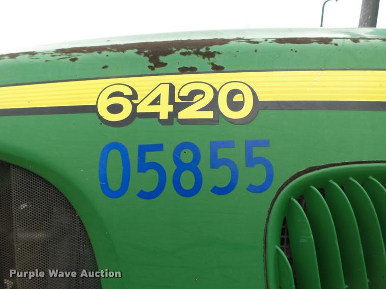 image for item DA2749 2002 John Deere 6420 MFWD tractor
