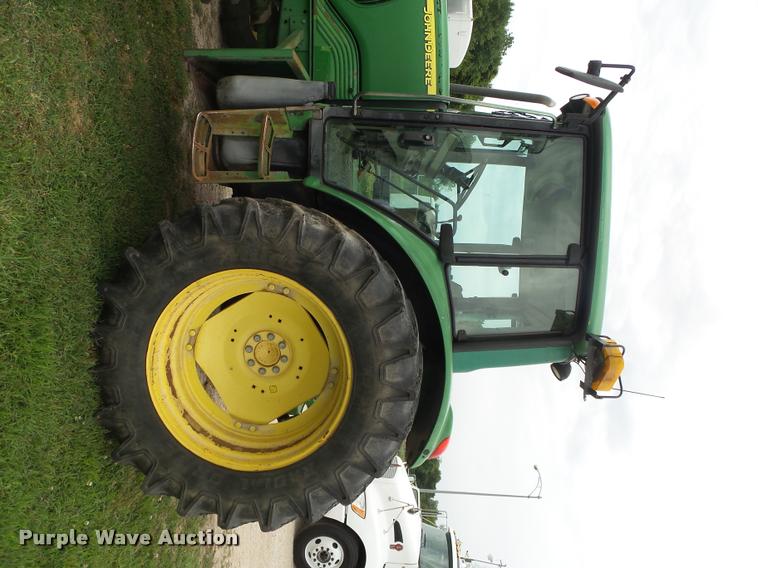 image for item DA2749 2002 John Deere 6420 MFWD tractor