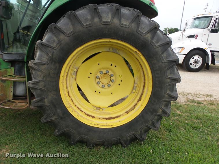 image for item DA2749 2002 John Deere 6420 MFWD tractor