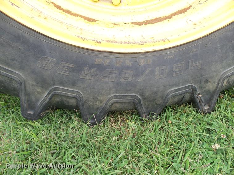 image for item DA2749 2002 John Deere 6420 MFWD tractor