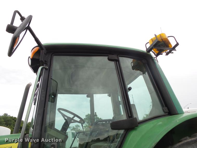 image for item DA2749 2002 John Deere 6420 MFWD tractor