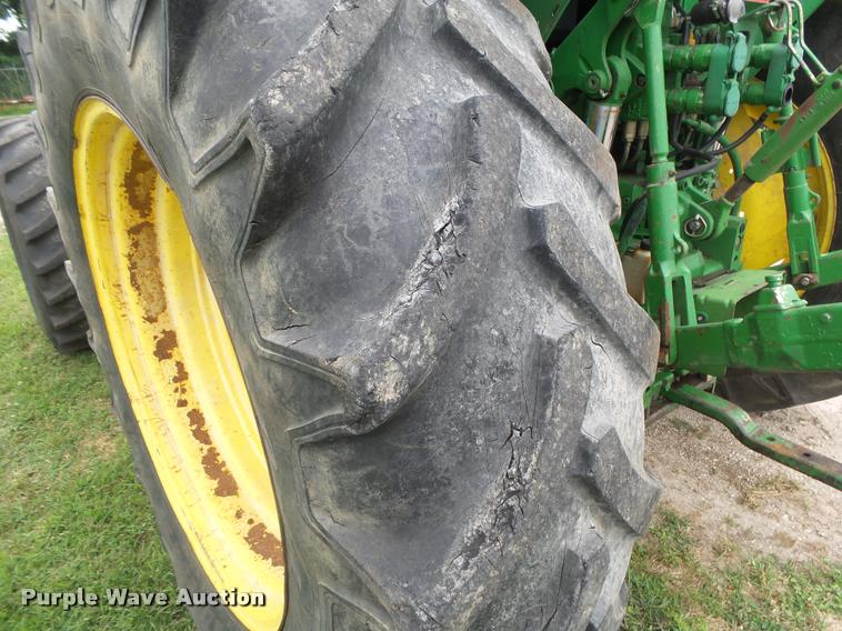 image for item DA2749 2002 John Deere 6420 MFWD tractor