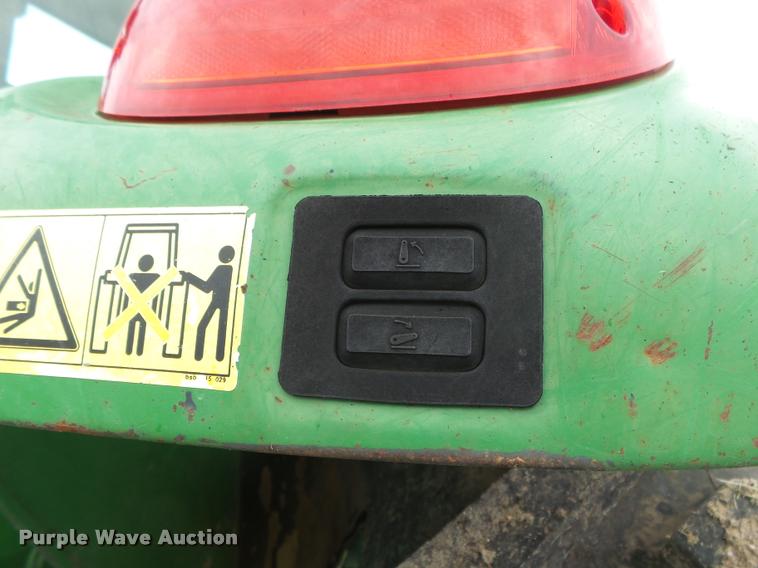 image for item DA2749 2002 John Deere 6420 MFWD tractor