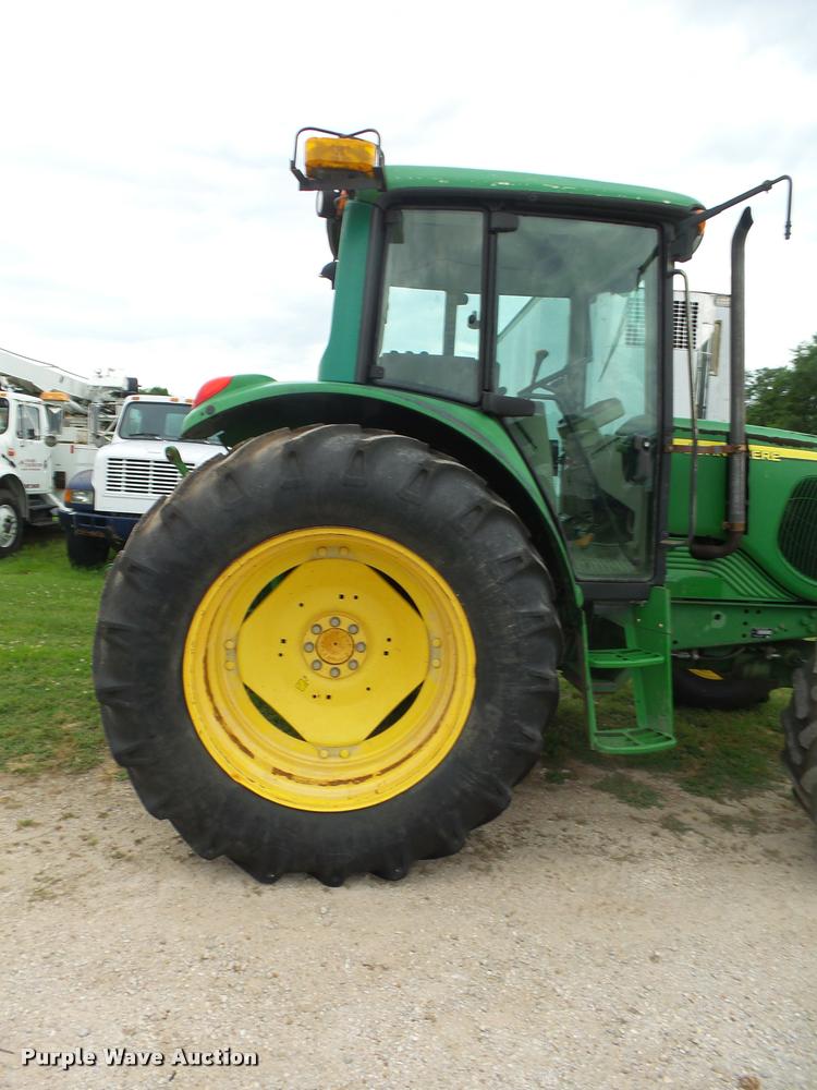 image for item DA2749 2002 John Deere 6420 MFWD tractor