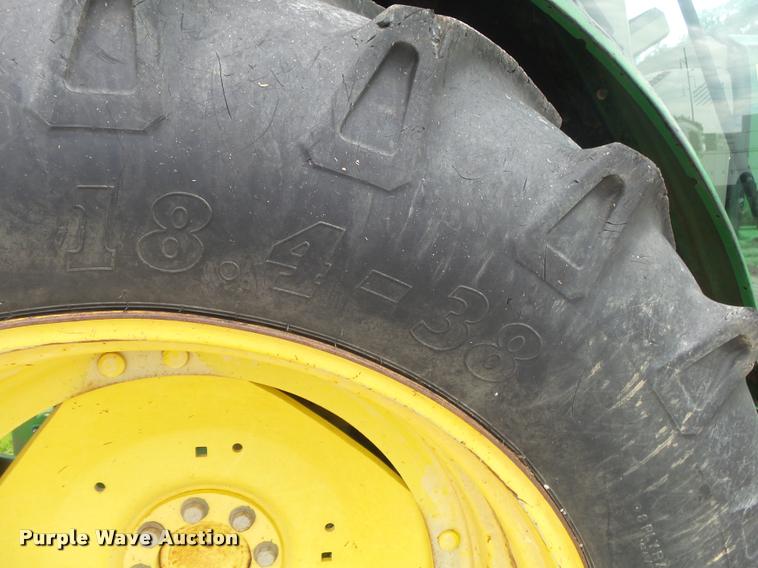 image for item DA2749 2002 John Deere 6420 MFWD tractor