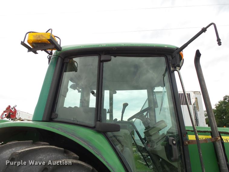 image for item DA2749 2002 John Deere 6420 MFWD tractor