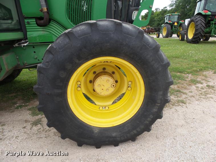 image for item DA2749 2002 John Deere 6420 MFWD tractor