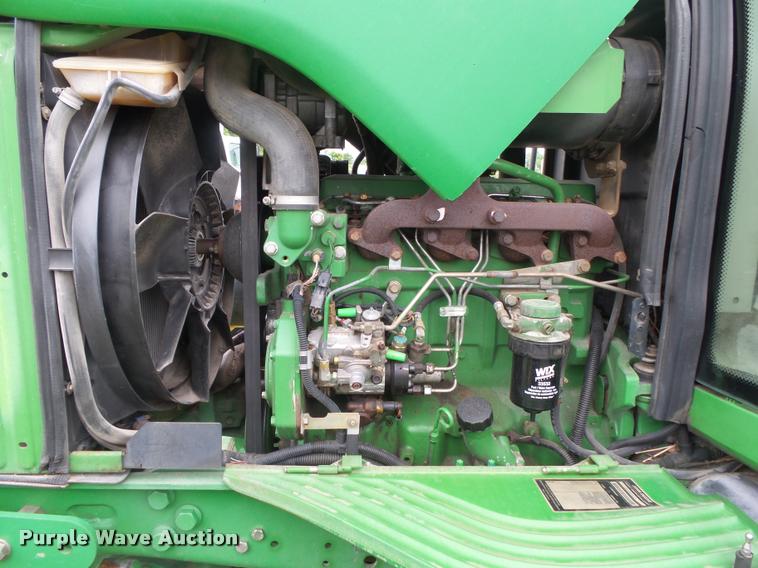 image for item DA2749 2002 John Deere 6420 MFWD tractor