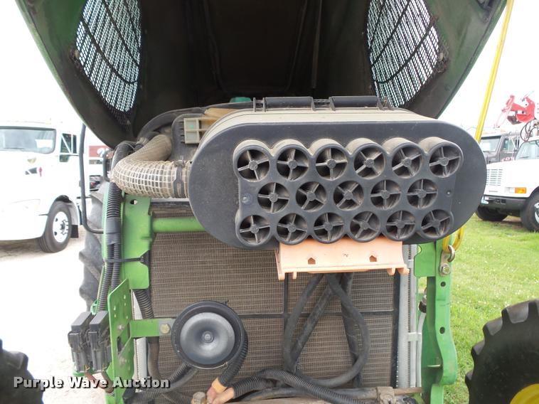 image for item DA2749 2002 John Deere 6420 MFWD tractor