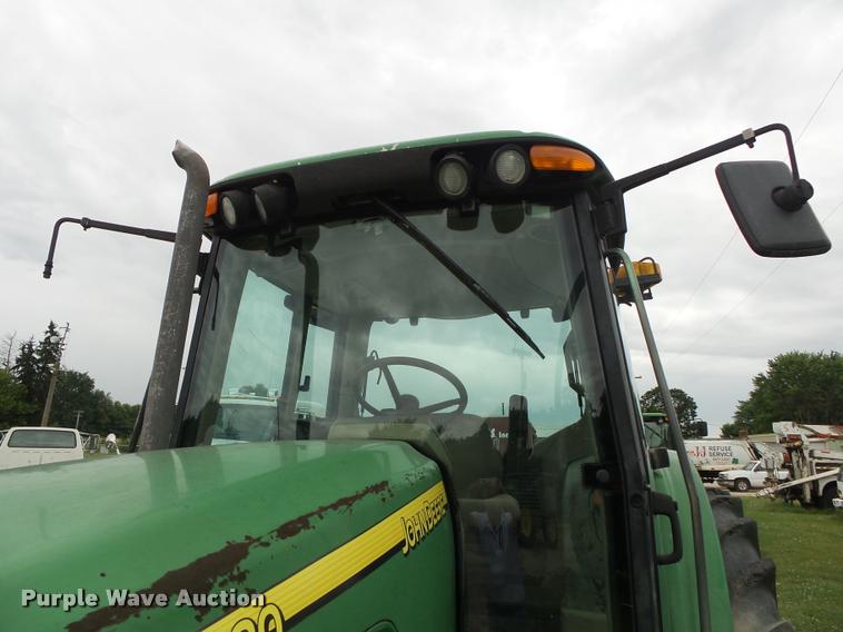 image for item DA2749 2002 John Deere 6420 MFWD tractor